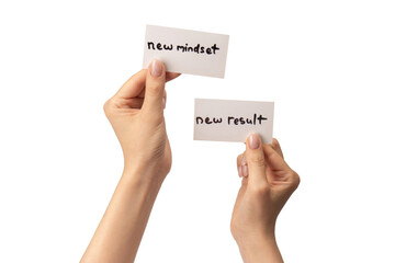 New mindset - new result  text on a card in a woman hand.