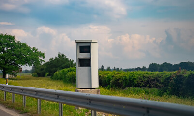 Modern speed camera on the freeway.