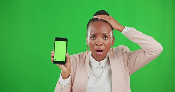 Shock, phone and woman in studio with green screen with a wtf, omg or wow face expression. Surprise, shocked and portrait of an African female model with cellphone or mobile by chroma key background.
