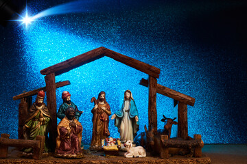Christmas Manger scene with figurines including Jesus, Mary, Joseph