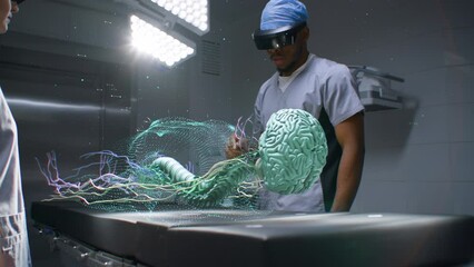 African American surgeon and nurse in VR headsets work in surgery room using futuristic holographic display. 3D graphics of human skeleton and organs. AI technology in medicine. Healthcare innovation. - Powered by Adobe