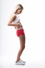 Fototapeta premium woman Checks physical condition mid-workout
