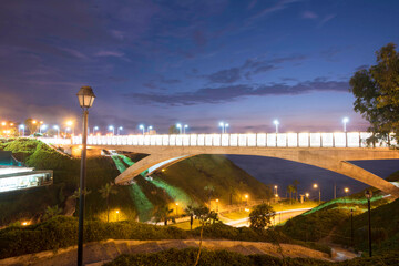 PERU Panoramic view of the Villena Rey Bridge of the Miraflores district with luxurious apartments and Pacific Ocean at night © Luis
