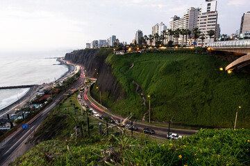 PERU Panoramic view of the Villena Rey Bridge of the Miraflores district with luxurious apartments and Pacific Ocean at night © Luis