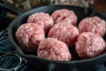 Fresh raw pork meatballs with spices