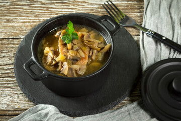 Stewed pork loin with mushrooms.
