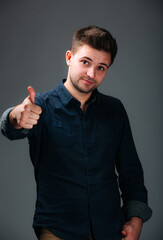 A man giving the thumbs up sign. The Encouraging Man With a Positive Attitude, Confidence, and...
