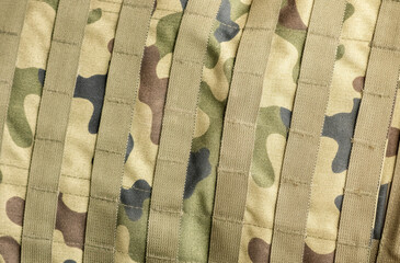 Professional generic green army military camo camouflage textile material with straps, full frame...