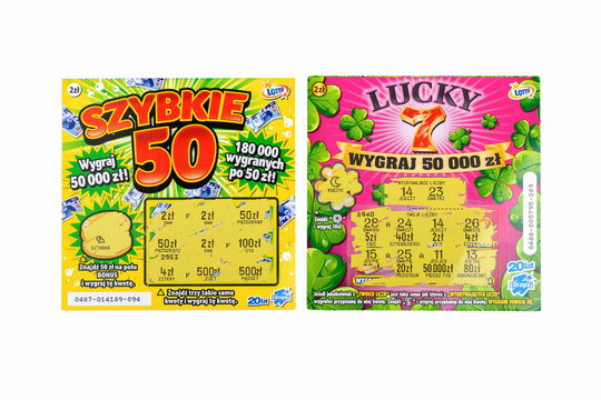 Two scratch off Polish lottery tickets. Gambling, winning money, two lottery paper coupons, tickets, scratchies, scratch cards isolated on white, cut out, top view