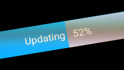 Generic updating system update process bar percentage meter on display, around 50 percent file...