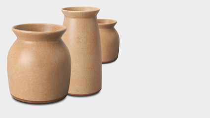 Closeup of earthenware ceramic jars, isolated on grey copy-space background.