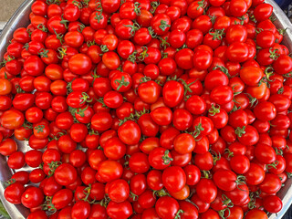 Red cherry tomatoes at the farmers' market.