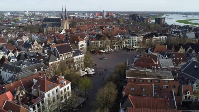 Drone flying over the Brink, medieval Dutch city  Deventer's main square, towards the Bergchurch.