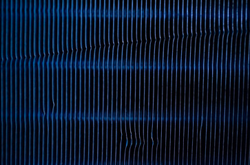 Modern abstract background in dark blue color with white stripes and light blue curves
