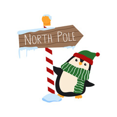 Cute Christmas penguin holding North Pole sign. Cartoon animal wearing a winter hat and a striped scarf.