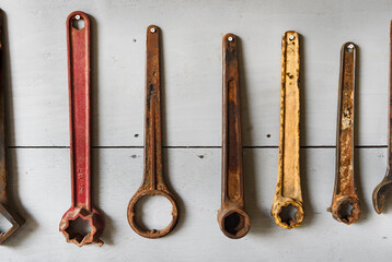 Line of Vintage Tools Hung on Wall