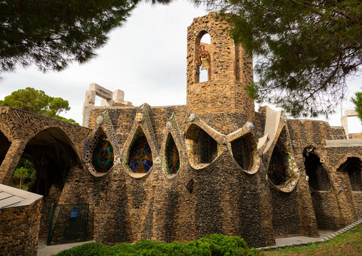 Exterior view of guell crypt, a masterpiece gaudi architecture located at catalunya outside town