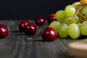 Sweet fresh cherries with other products