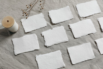 Composition of cotton paper business, place cards. Blank invitations mockups in row. Winter wedding...
