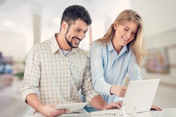 Mature manager mentor with young coworker,