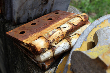 Close up of rusty old metal hinges