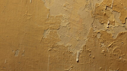 Peeling cream walls and subtle nail marks add character to the weathered house, hinting at its...