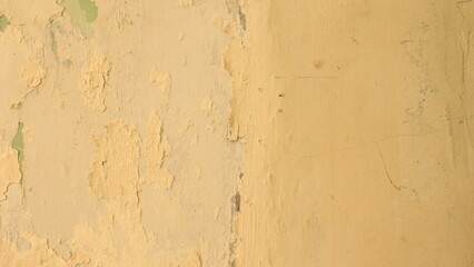 The patina of time adorns the weathered wall, each crack and groove telling a story of its own.