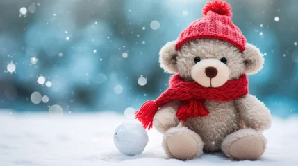 Fotobehang Winter banner with teddy bear wearing a cute scarf and hat. Snowing, Christmas. © Jacques Evangelista