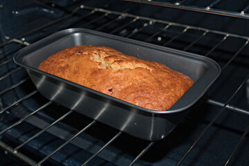 Baked Banana Bread in Pan on Oven Grill