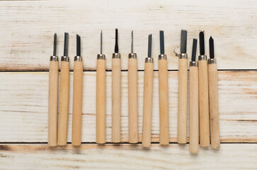 Carpenter tools on wooden background,top view