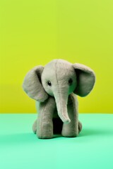 elephant plush toy isolated on green background