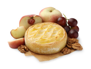 Naklejka na ściany i meble Tasty baked brie cheese with grapes, peaches and walnuts isolated on white