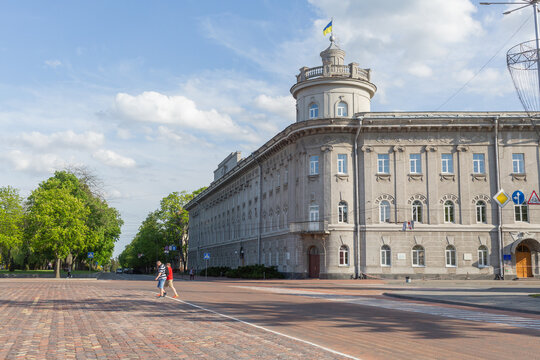 pedestrians and Sovie-style architecture in Red Square in chernihiv