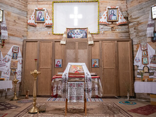 wooden interior with icons inside St. George's Church in Chernihiv