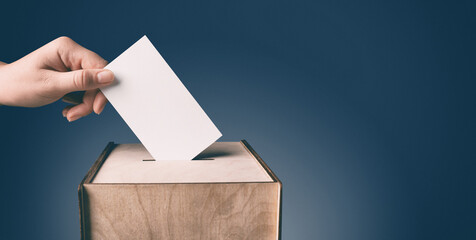 Woman putting her vote into ballot box on gradient color background, closeup. Banner design with...