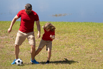 Father and son are part of a sporty family that loves playing football together. They spend...