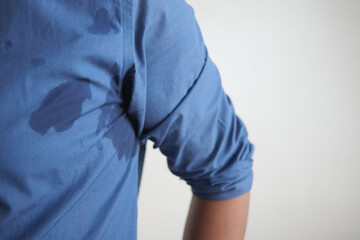 man with wet armpits Smelly odor from sweat .