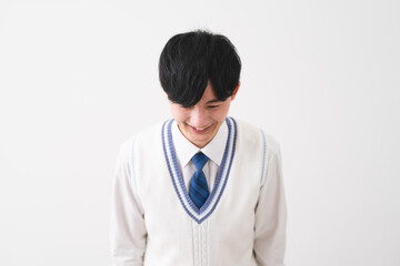 学生服を着ている若い男性　学生イメージ