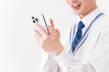 学生服を着ている若い男性　学生イメージ