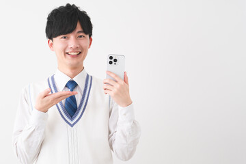 学生服を着ている若い男性　学生イメージ