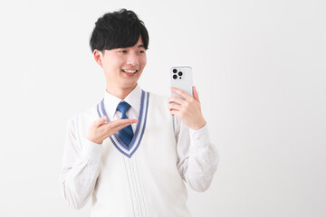 学生服を着ている若い男性　学生イメージ