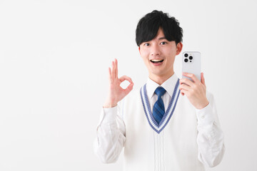 学生服を着ている若い男性　学生イメージ