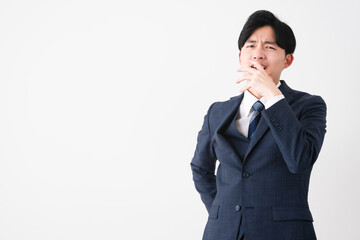 ビジネススーツを着ている若い男性　ビジネスイメージ