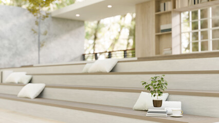 A modern, minimal spacious library or building hall with large stairs for reading and relaxing.