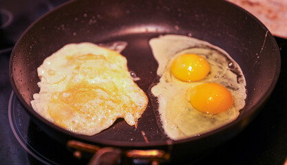 brown eggs in a rustic basket on wooden table, natural light, farm-fresh concept