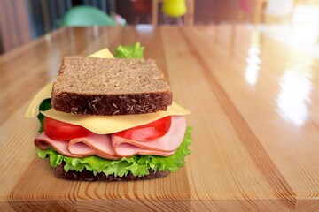 Tasty fresh cheese sandwich on the desk
