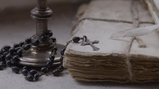 Ancient bible scholars study religious texts on weathered scrolls and documents - history and faith