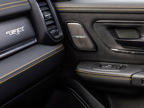 Novosibirsk, Russia -  November 20  , 2023:       Dodge Ram Trx, close-up of a music column Harman Kardon Logic.