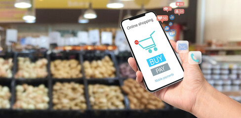 Hand holding new smartphone . Smartphone