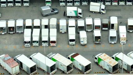 The drone's eye captures the distribution center's vast expanse, revealing a central node where products converge and diverge, ensuring swift and smooth supply chain operations.
